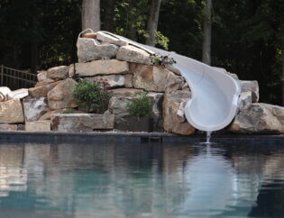 Knoxville Hardscape Project with pool slide